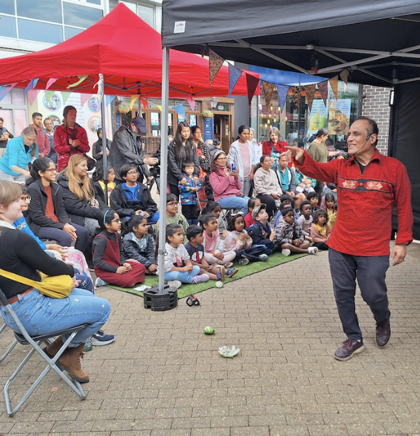 Rez Kabir storyteller engages the audience in a market place