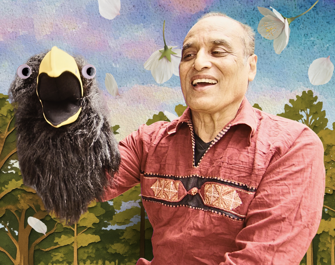 storyteller Rez Kabir with a puppet craw against a painted forest backdrop
